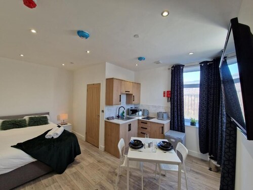 Comfortable Living Space: Flat 2 offers a modern studio apartment