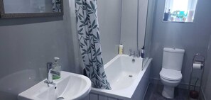 Hair dryer, towels, soap, toilet paper