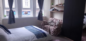 3 habitaciones, tabla de planchar con plancha, wifi y ropa de cama