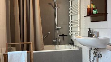 Hair dryer, towels, soap, toilet paper