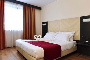 In-room safe, desk, laptop workspace, blackout drapes - Raya Hotel (Mediglia)