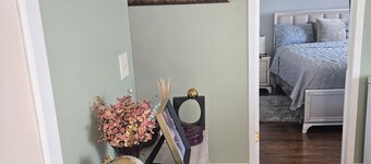 Tranquil room and bathroom in a house with AC and central heating system