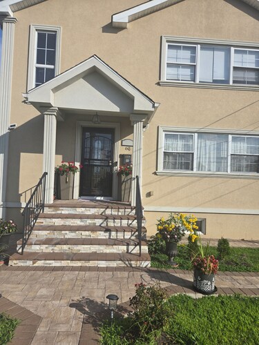 Tranquil room and bathroom in a house with AC and central heating system