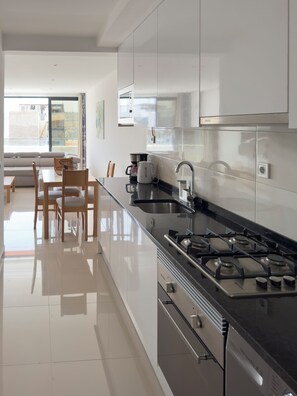 Fridge, microwave, dishwasher, coffee/tea maker