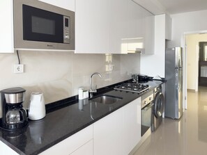 Fridge, microwave, dishwasher, coffee/tea maker