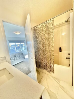 Hair dryer, towels, soap, toilet paper