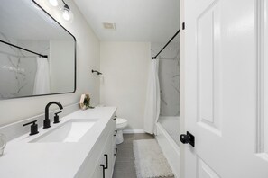 Hair dryer, towels, soap, toilet paper