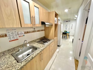 Fridge, microwave, stovetop, coffee/tea maker