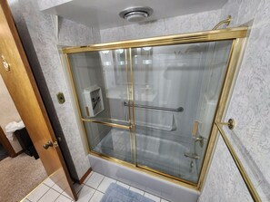 Shower, hair dryer, towels, soap