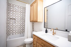 Shower, towels, toilet paper