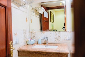 Hair dryer, slippers, towels, soap