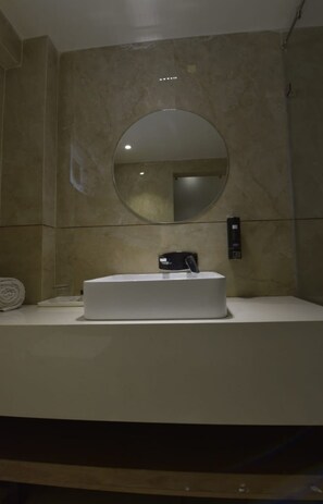 Economy Double Room | Bathroom | Shower, free toiletries, towels, soap - Hotel Surya Jabalpur (Jabalpur)