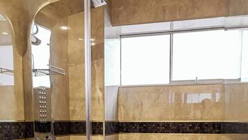 Shower, hair dryer, towels, soap