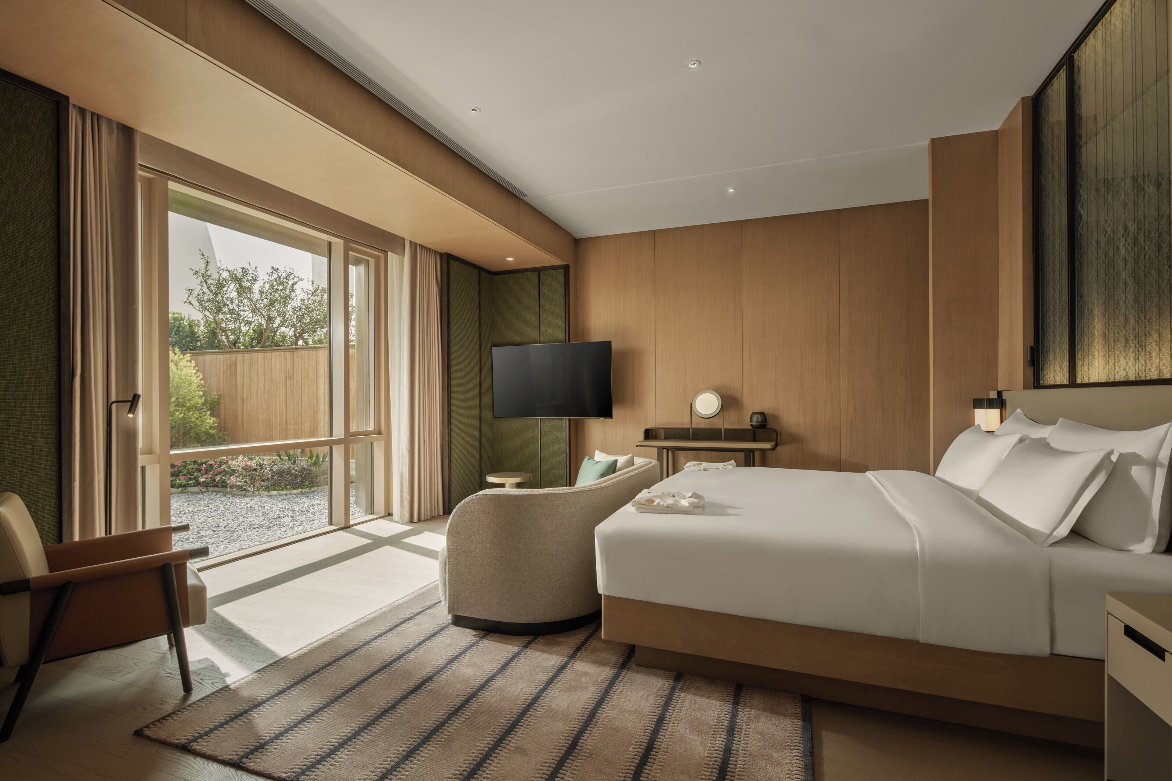 Premium-sengetøj, dundyner, minibar, pengeskab på værelset