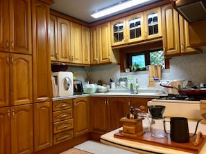 Fridge, microwave, cookware/dishes/utensils