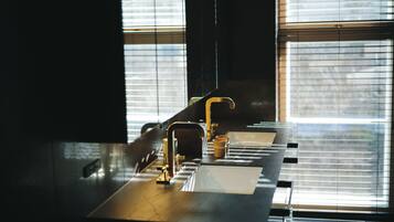 Suite, Multiple Beds, Non Smoking, Private Bathroom | Bathroom | Separate tub and shower, hair dryer, slippers, towels