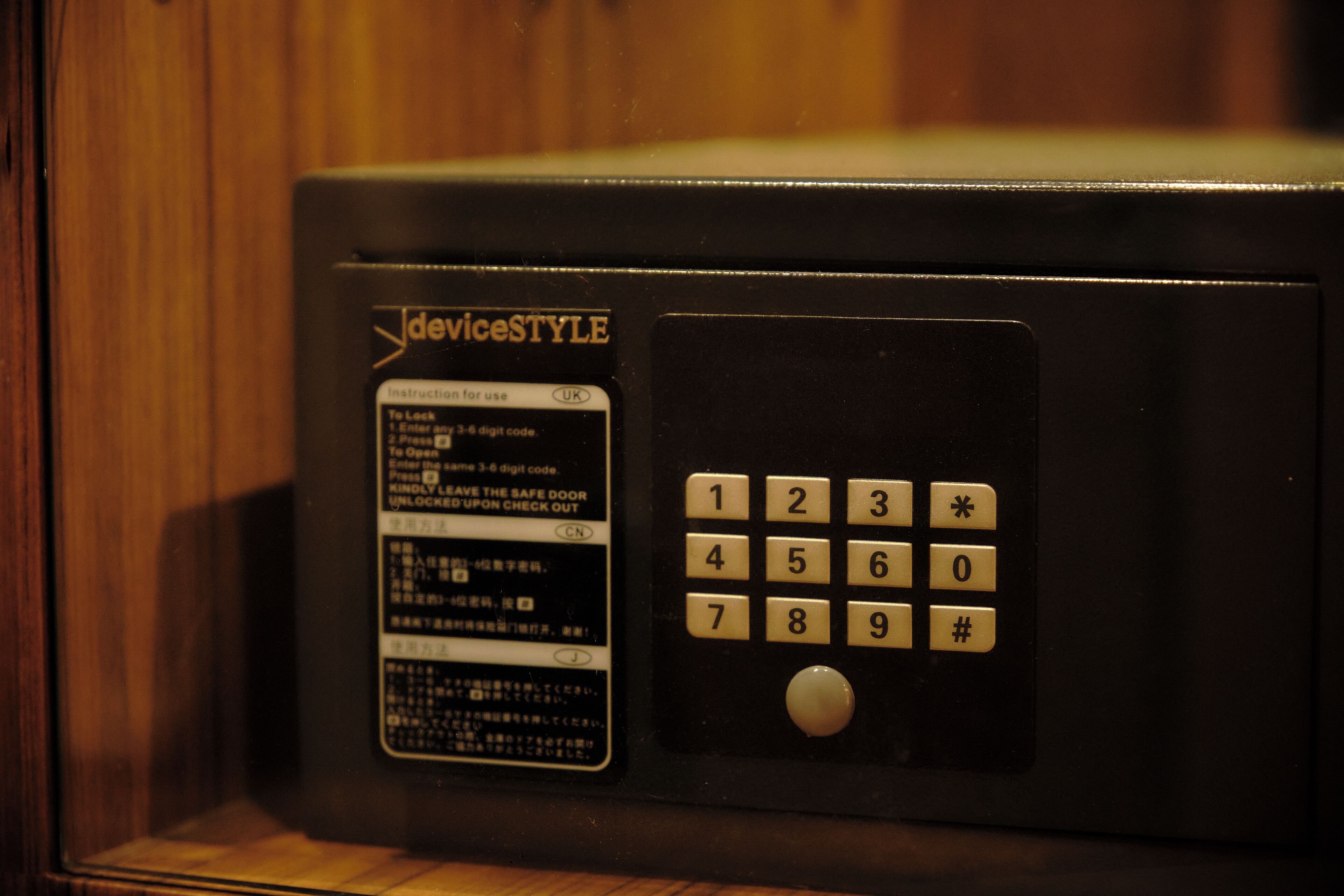 A microwave with a keypad and a digital display.