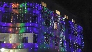 A building with multiple floors, each illuminated with colorful lights. - Haor Bilash Guest House (Sunamganj)