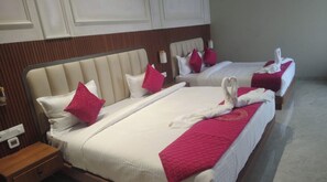 Family Room | Desk, laptop workspace, iron/ironing board, free WiFi - Hotel Tanishka INN (Mathura)