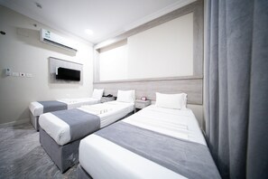 Minibar, blackout curtains, iron/ironing board, free WiFi