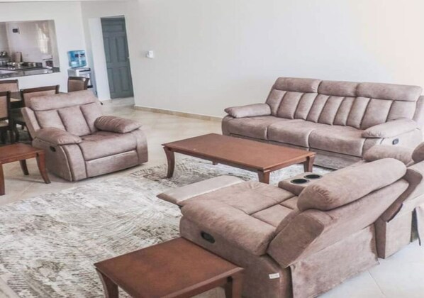 Apartment, 2 Bedrooms, Balcony, Pool View | Living area
