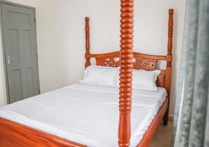 Apartment, 2 Bedrooms, Balcony, Pool View | Iron/ironing board, free WiFi