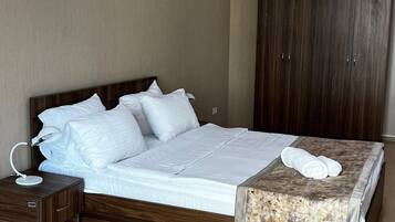 Classic Apartment, 3 Bedrooms, Non Smoking, City View | Desk, soundproofing, iron/ironing board, free WiFi