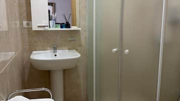 Deluxe Double Room, City View | Bathroom | Hair dryer, slippers, towels, soap