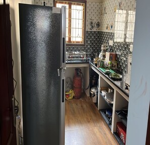 Apartamento standard | Cozinha privada | Frigobar, cooktop, talheres/pratos/utensĂlios de cozinha