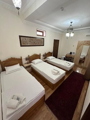 Standard Triple Room, Courtyard View | Free WiFi