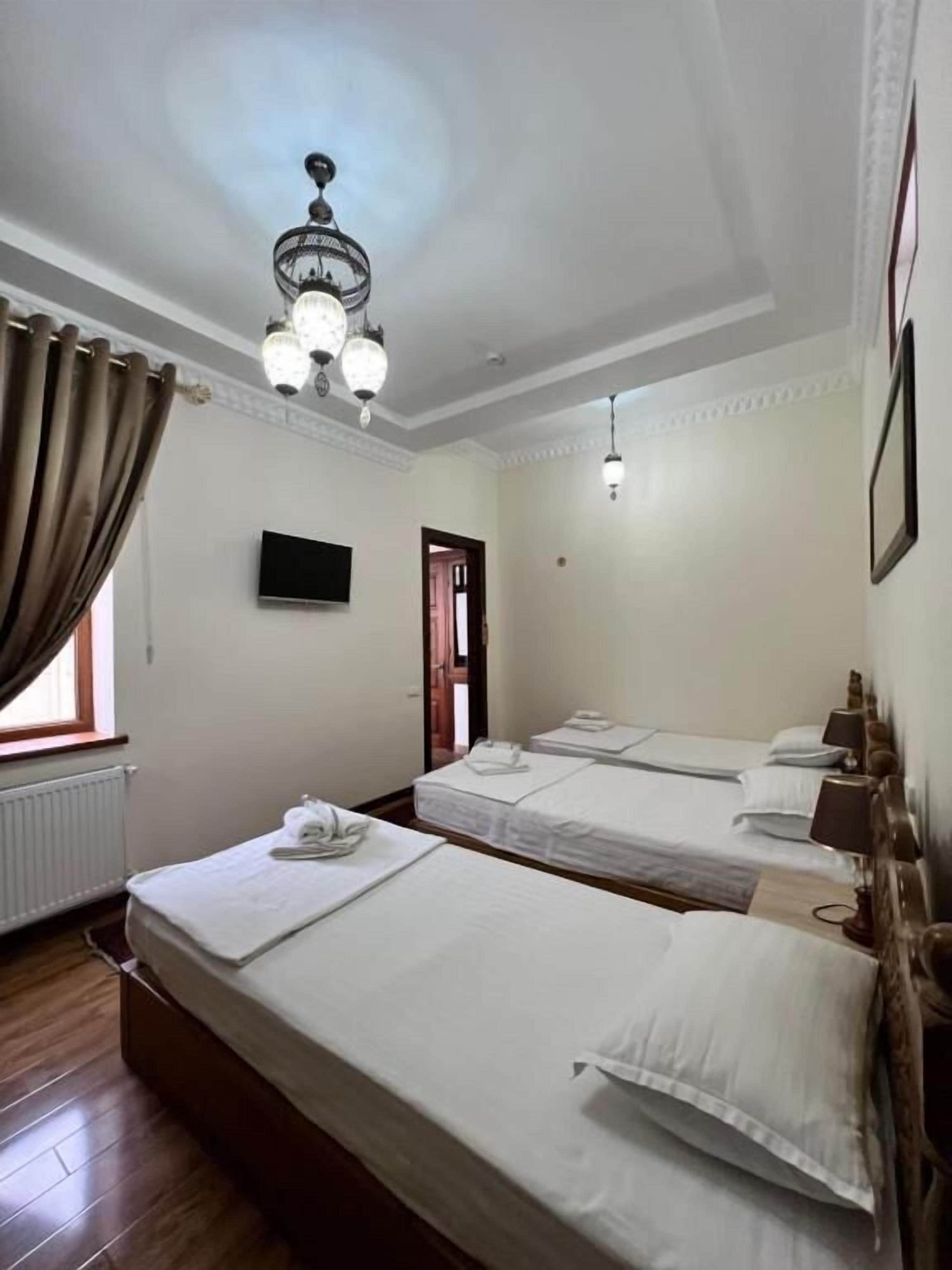 Kamar Triple Standar, pemandangan halaman | Wi-Fi gratis