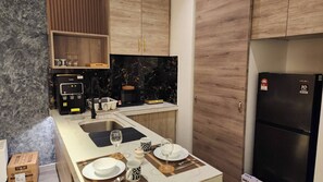 Fridge, microwave, stovetop, cookware/dishes/utensils