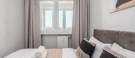 Comfort Apartment, Balcony, Courtyard View | Blackout curtains, iron/ironing board, cots/infant beds, travel cot