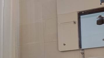 Shower, towels, soap, shampoo