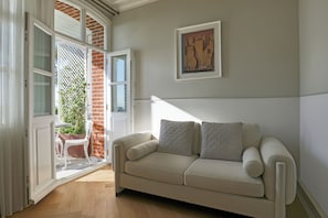 Deluxe Double Room, Balcony, Garden View | In-room safe, laptop workspace, blackout drapes, soundproofing