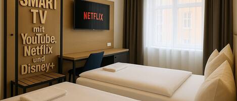 Down comforters, desk, free WiFi, bed sheets