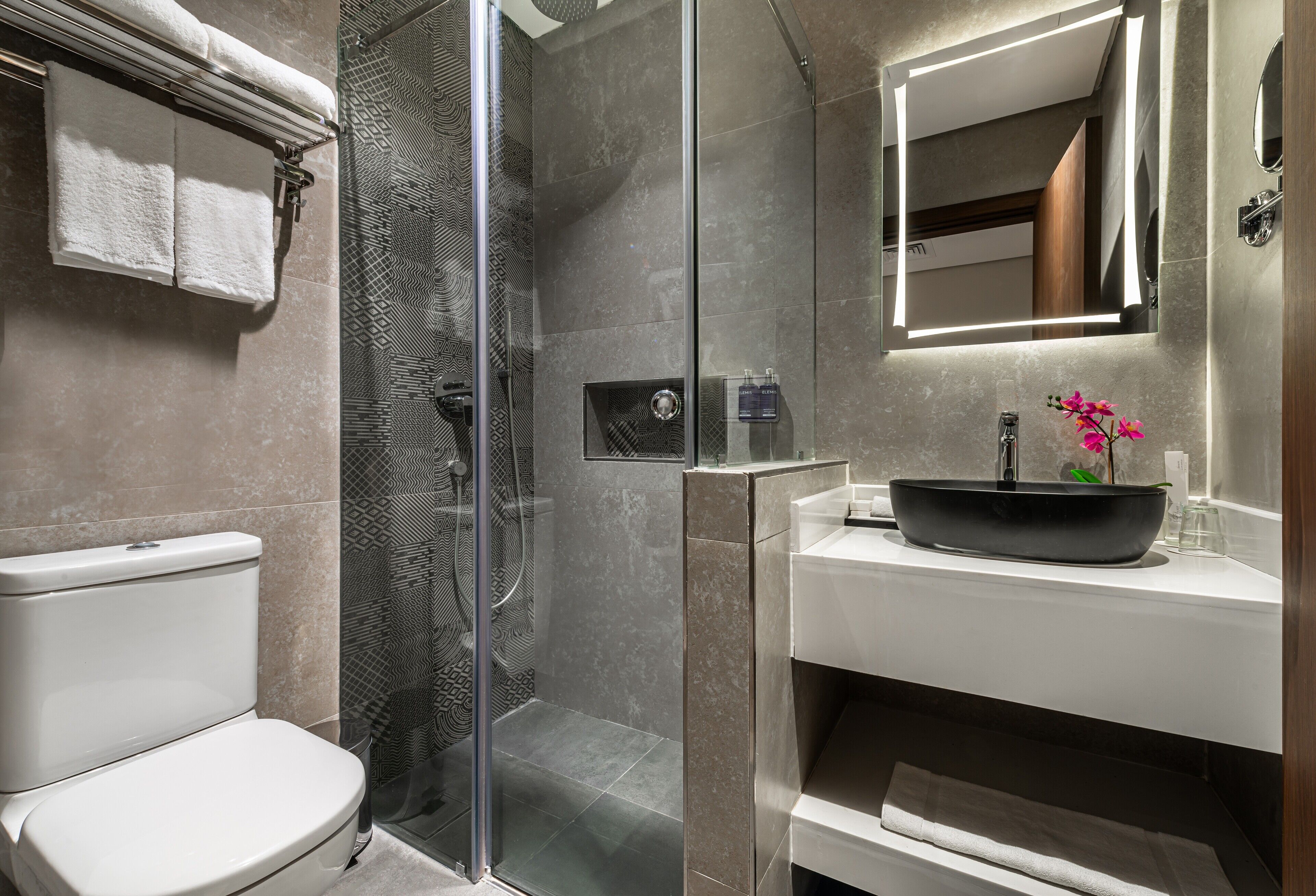Bathtub, hair dryer, bathrobes, slippers