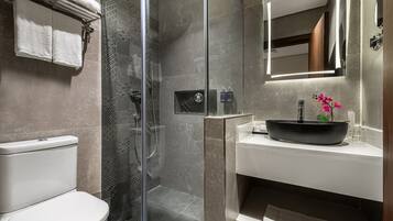 Bathtub, hair dryer, bathrobes, slippers