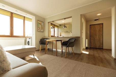 Comfort Apartment, Balcony | Living area | 40-cm flat-screen TV with cable channels