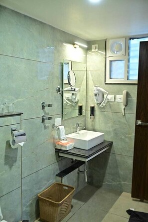 Hair dryer, slippers, towels, soap