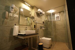 Classic Room | Bathroom | Hair dryer, slippers, towels, soap