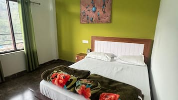ห้องดีลักซ์ | เตียงเสริม/เปล, Wi-Fi ฟรี, ผ้าปูที่นอน