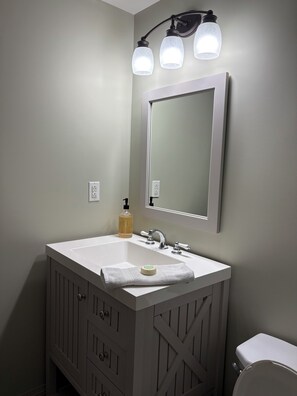 Hair dryer, towels, soap, toilet paper