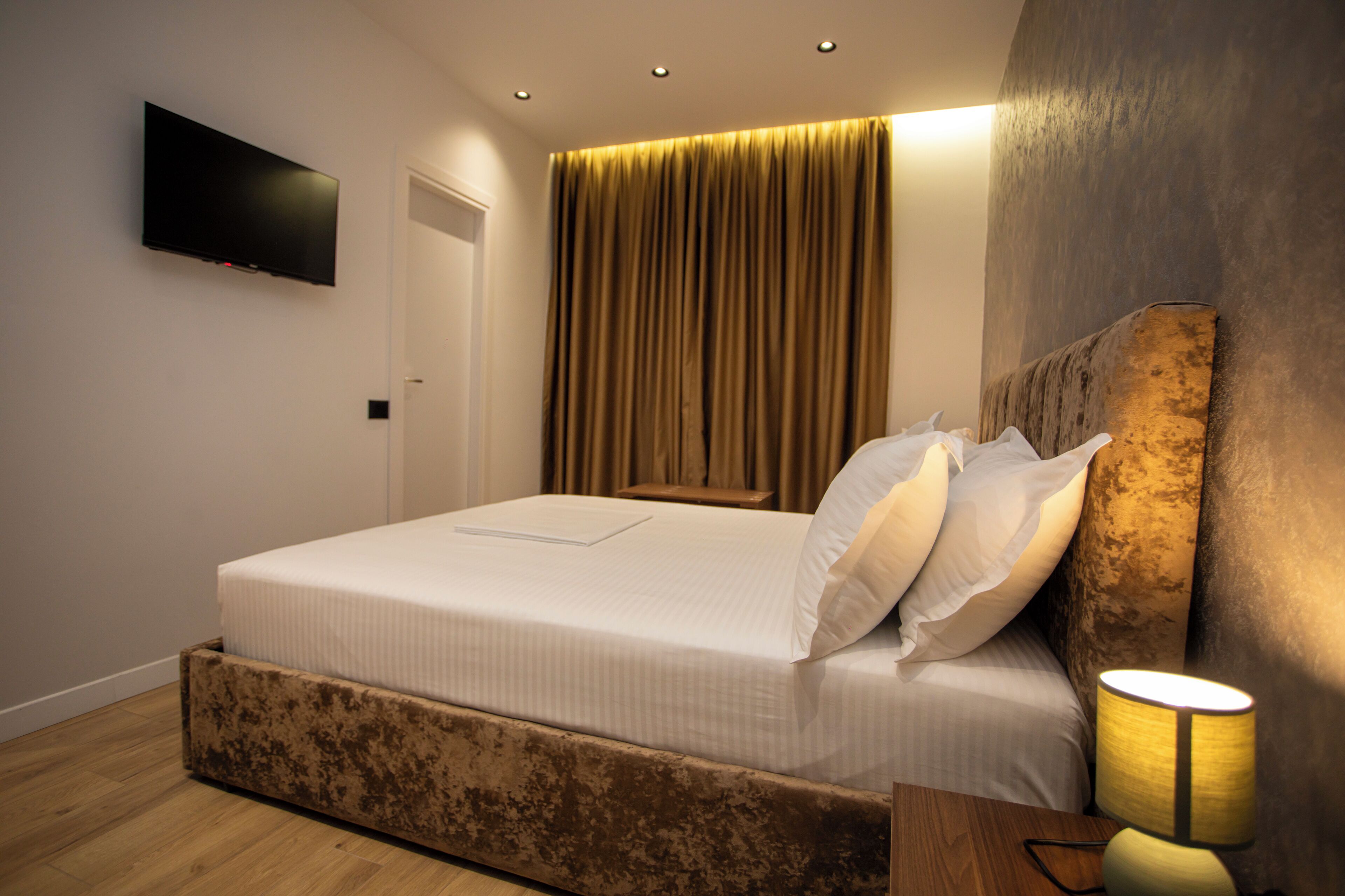 Deluxe Double Room, City View | In-room safe, desk, laptop workspace, iron/ironing board