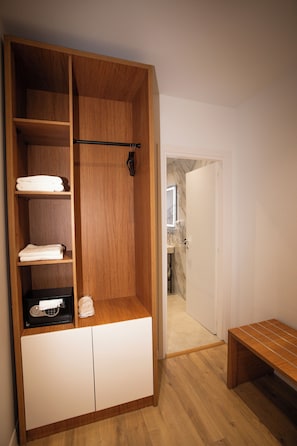 Family Quadruple Room, Patio, City View | In-room safe, desk, laptop workspace, iron/ironing board