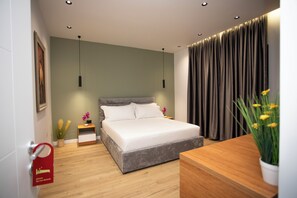Deluxe Double Room, City View | In-room safe, desk, laptop workspace, iron/ironing board - Villa Klaus Center Hotel (Tirana)