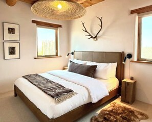 2 slaapkamers, een strijkplank/strijkijzer, gratis wifi, beddengoed