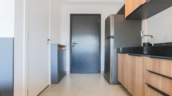 Fridge, microwave, stovetop, cookware/dishes/utensils