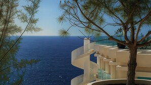 A coastal building with a balcony overlooking the sea, surrounded by trees. - STORY Le Carrousel Rabat (Rabat)