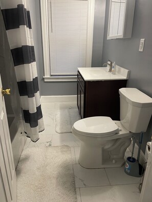 Hair dryer, towels, soap, shampoo